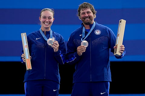 Archery mixed team medal ceremony: Bronze medallists Casey Kaufhold and Brady Ellison of United States